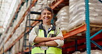 Logistics, face and mature woman with arms crossed in warehouse for supply chain, quality control or distribution. Shipping, confidence and employee for export industry, supplier or storage facility