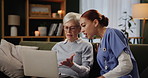 Laptop, nurse and help senior woman in living room of retirement home for information, question or problem. Computer, caregiver and assistance of patient on internet for advice, teaching and learning