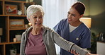 Stretching pain, physical therapy and senior woman with caregiver in clinic for consultation, healthcare or workout. Support, nurse and elderly patient for exam, arthritis training or rehabilitation