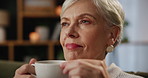 Coffee, senior or woman thinking in house with memory, ideas or calm peace on living room. Nostalgia, remember or elderly lady with decision, tea beverage or wellness in retirement, lounge or home