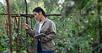 Woman, weed and farm or garden with tablet, checking quality and sustainable eco friendly environment for growth. Smell, cbd strains and stivia marijuana plant, thc production and online review