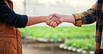 Greenhouse, handshake and deal for agriculture business, partnership or b2b agreement of farmers. Farm, shaking hands and people in collaboration together for teamwork, support or thank you at garden