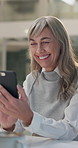 Smile, phone and mature business woman reading email, good news or info on internet in creative startup at night. Manager, mobile and scroll on website, social media and editor networking on deadline