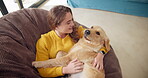 Woman, dog and pet in home for love, affection and trust or support in living room. Puppy, training and Golden retriever for adoption or rescue for animal, owner person and hug and canine best friend