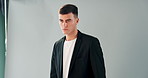 Photoshoot, fashion model and man in studio on set for professional shot, style and magazine brand. Photography, backstage and person with camera, flash and picture for clothing, designer and outfit