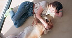 Above, woman and dog on floor in home for friendship, bonding and love with care and happy. Female person, pet and animal owner with playing for fun, relax and enjoy for welfare and adoption