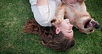 Happy woman, dog and play on grass to relax, care or friends bonding together in top view outdoor. Animal, girl or pet owner with golden retriever at park on lawn for love, smile or tickle game above