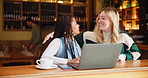 Laptop, friends and women in coffee shop with hug for university learning, group project or scholarship. Student, online and people with computer for education, knowledge or studying in restaurant