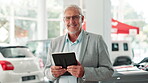 Mature man, car dealership and tablet for sales, auto and showroom for professional. Portrait, technology and manager and eccomerce, seller and male person for customer service agent for vehicle