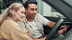 Couple, dealership and touch of car, choice and talking for purchase, happy and vehicle with update. Shop, man and woman with hands in transport, discussion and test drive, smile and New York