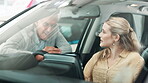 Woman, salesman and pitch for dealership, sale and discussion for auto deal or purchase. Girl, buyer and vehicle with features, promotion and new car for transportation or travel for ownership choice