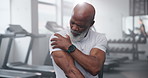 Gym, senior man and arm with pain in training for fitness, tension or health problem in exercise. Workout, frustrated and male person with stress in injury for fibromyalgia, muscle strain or accident