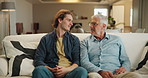 Senior father, son and talking on sofa for support, advice and happy bonding together in home. Conversation, dad and adult child chat on couch with respect, care and relax on weekend in living room.