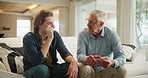 Senior father, son and talking on couch for support, advice and happy bonding together in home. Conversation, dad and adult child chat on sofa with respect, care and relax on weekend in living room.