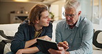 Sofa, senior father and son with tablet, phone and help with online search, network or connection in home. Confused, dad and adult child chat on couch with digital app, advice and relax on weekend