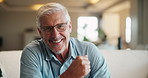 Happy, sofa and face of old man laugh for relaxing, chill and enjoy weekend in living room. Home, retirement and portrait of elderly person smile on couch with confidence, joy and cheerful in house