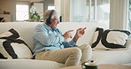 Freedom, dance or senior man with headphones on sofa for music, fun and digital audio, playlist or streaming at home. Radio, earphones or old male in living room with retirement, celebration or sound