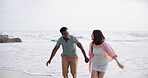 Couple, holding hands and running on beach with love for romantic date, relationship support and travel together. Man, woman and vacation on seashore for adventure, explore and summer sunset holiday