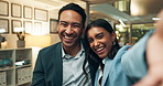 Happy, business people and selfie with photography at night for memory or moment at office. Portrait of young businessman and woman with smile for picture, capture or friendship together at workplace