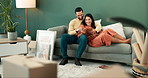 Couple, home and happy with moving on couch with tablet for buying or purchasing furniture. New house, relationship and people with smile or satisfied with ownership or property and online shopping