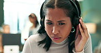 Girl, listening and consulting or telemarketing in call center, inbound tech support and contact us or faq. Woman, headset and thinking in office for business crm, virtual assistant and conversation.
