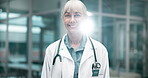 Portrait, doctor and mature woman with smile, outdoor and happy with healthcare, science and stethoscope. Hospital, face and medical professional with equipment of wellness, specialist and confidence