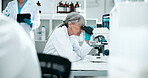 Microscope, science and test with woman in laboratory for breakthrough, discovery or experiment. Innovation, medical sample and research with mature scientist at work on cure or vaccine for biology