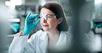 Woman, ppe and computer in laboratory for science, analysis and innovation at night. Technology, development and medical professional in clinic for investigation, review and inspection of results