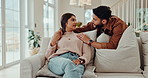 Kiss, happy and couple on sofa for talking, loving relationship and relax together in home. Marriage, morning and man and woman on couch for bonding, embrace and romance in living room on weekend