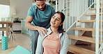 Couple, home and man massage from fitness, workout and exercise injury with back pain. Relax, physical therapy and marriage in a lounge with yoga and gym mat with muscle support and care together