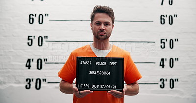 Man, criminal and suspect with sign for arrest, mugshot or violation in ...