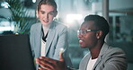Business, people and computer at night in office for deadline, research and work on project as accountant. Employee, teamwork and collaboration with explaining or teaching and explain with feedback