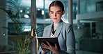 Business woman, night and research with tablet for news, online browsing or project at office. Female person or analyst working late or scrolling with technology for corporate data, agenda or tasks