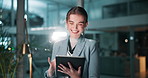 Business woman, night and laughing with tablet for funny joke, meme or social media at office. Young female person or employee working late or scrolling with smile on technology for humor or comedy