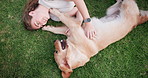 Sunshine, dog and girl in park, grass and weekend break with learning, smile and best friends. Person, woman and pet owner with nature, sign or symbol with happiness, game and outdoor for fun or play