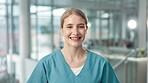 Face, healthcare and medicine with nurse standing in hospital for treatment or insurance. Portrait, medical woman and trust with medicine professional and scrubs uniform in clinic for appointment