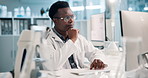 Science, thinking and man in laboratory with computer for results, online test and medical study. Technology, scientist or lab technician reading web review, report or data on pharmaceutical research