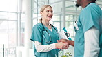 Nurse, people and handshake for health care advice, support and information of patient history on clipboard. Medical worker shaking hands for introduction, hello and welcome with document for clinic