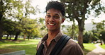 University, face and man with backpack at campus park for education, learning or future career goal outdoor. College, scholarship or portrait of happy gen z student outside for study opportunity