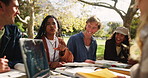 Students, laptop and outdoor conversation for study break with books and learn for english assessment or test. Computer, gen z people and friends talking in park for college education and knowledge