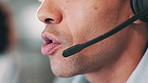 Businessman, mouth and mic with headphones for customer service, support or online advice at office. Closeup of man, agent or consultant talking with microphone for telemarketing or help at workplace