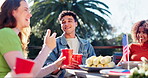 Happy, independence day and people with drinks at party for celebration of USA culture. American, pride and group of friends relax outdoor on holiday event in summer with freedom and beer together