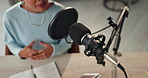 Talking, microphone and woman in office for audio podcast, radio station or virtual broadcast. Above, news show and female presenter for politics, content creation or conversation on voting results