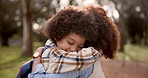 Happy, black child and mother with hug for love, embrace or outdoor bonding together in nature. Young African, mom and little boy or kid with support for childhood, youth or happiness at park outside