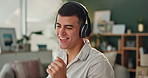 Happy, dance and man with headphones in office for online radio, sound and listening to music. Relax, audio and creative person with energy at workplace for podcast, subscription or digital streaming