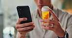 Hands, phone and person with pills for medicine research, reading label or health warning. Smartphone, medication bottle and information for drugs online, side effects or supplement in home closeup