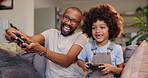 Happy father, child and playing with video games on sofa for fun bonding, leisure or weekend at home. Excited dad with son, little boy or kid on console or controller for co op gameplay at house