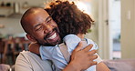 Happy, hugging and dad with child on sofa relaxing in living room for fathers day celebration. Smile, love and boy kid embracing black man on couch in lounge for bonding together at family home.