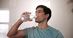 Man, drinking water and health in gym with fitness for exercise break, thirsty and hydration for body wellness. Athlete, person and sunlight with liquid for fatigue from training or physical activity