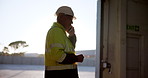 Phone call, industry and man construction worker on site with communication for maintenance deal. Planning, technology and male engineer on mobile discussion for networking on building or repairs.